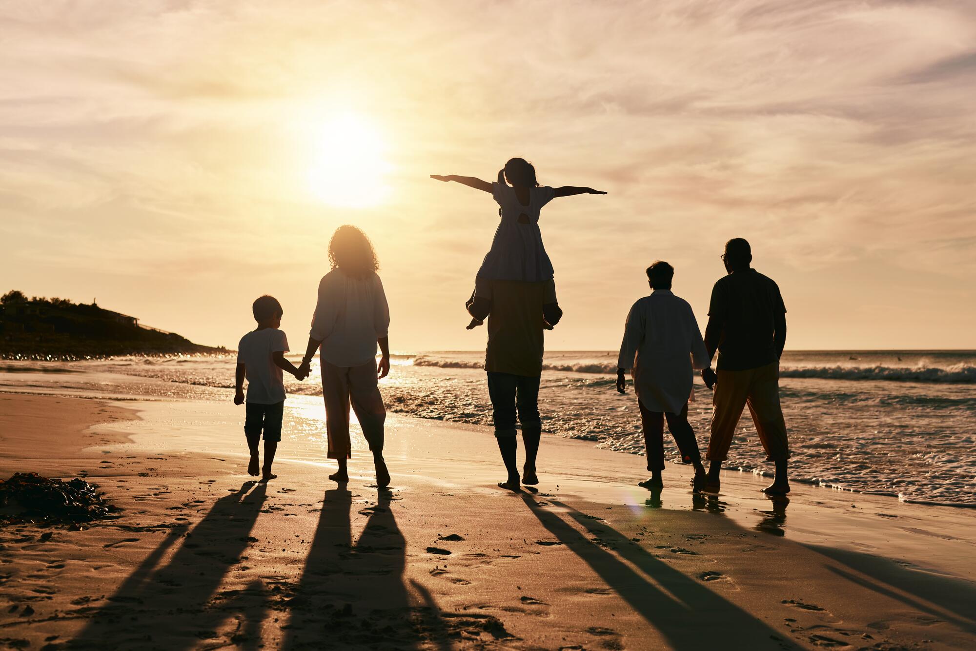 family beach sunset